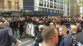AFC Ajax supporters march in central London, UK