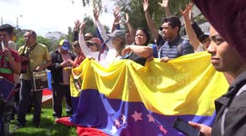 Protesters show support for Guaido at Venezuela's consulate in Colombia