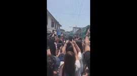 Tourists Scramble For Pictures At Famous Train Market