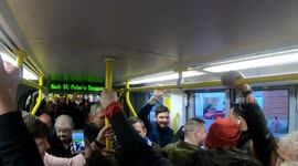 Manchester united fans singing in the tram after match