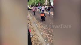Woman completes London Marathon with BROKEN ankle - after wrapping leg in bandages 18 miles from finish