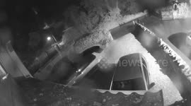CCTV captures strong winds tossing trampoline onto road