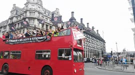 The Cleaners and Allied Independent Workers Union's Bus passing through Parliament Square at Mayday 2019, London, UK