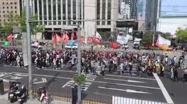 Seoul protests outside city hall including some French yellow vest protestors