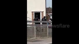 Mobile footage of raid on London house for suspect