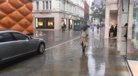 Heavy rain Hits Bond Street in London