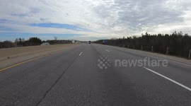 Hyperlapse POV driving on Ontario highway with car and truck traffic