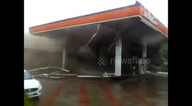 Dramatic moment Indian petrol station is engulfed in dust by cyclone winds