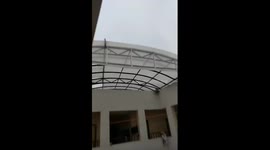 Watch roof being blown off of building by cyclone Fani in eastern India