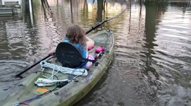 Missouri family go kayaking in flooded front yard