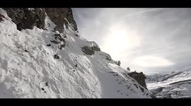 Drone weaves through Swiss Alps capturing scenic landscape
