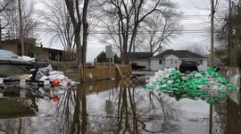 police patrolling Lauzon street in pierrefonds Montreal Flood Quebec 2019