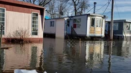 trailer park in Ile bizzard, montreal quebec flooded out into the lake