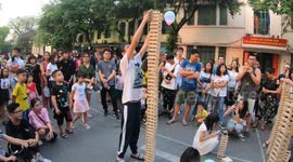 Suspense Heartbeat when watching children Play with wooden building blocks - A record height