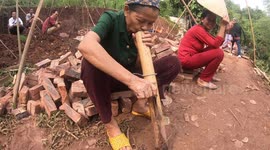 64-year-old woman smoking waterpipe tobacco in Vietnam