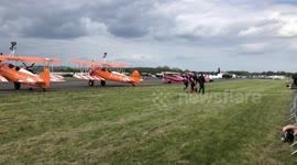 Wing walkers practice their routine on the ground ahead of their air display