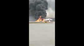 Passengers escape burning Aeroflot jet using emergency slides