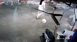 Man almost struck by butcher knife that fell out of the sky in south China