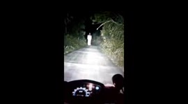 Spooky moment 'ghost woman' spotted wandering on road in China