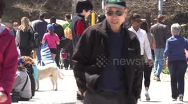 First warm sunny spring day of the season in Toronto brings thousands of people out to the beach