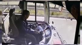 Distracted coach driver rear-ends another vehicle while checking his phone
