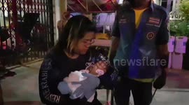 Baby abandoned in washing machine is saved by shopkeeper