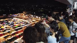 Stunning view of multi-coloured market stall roofs becomes popular selfie destination in Thailand