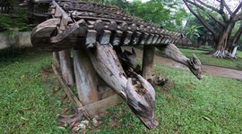 Cotu tomb house. Strange and unique tomb is made of wood.