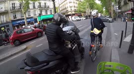 Bulldog on a scooter in Paris. 7 may 2019. Boulevard Saint Germain, France.