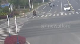 Man walks horse on Audi in China