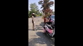 Kids do starjumps as punishment for not wearing helmets