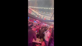 Liverpool fans in Concert Square celebrate their incredible win over Barcelona