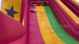 Child epic fall (fail) down a slide