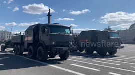 Russian military tanks parade through St. Petersburg's Palace Square on Victory Day