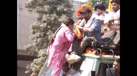 Bollywood superstar-turned-politician gets kisses from ardent supporters