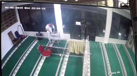 Thieves caught on CCTV stealing mosque charitable donations in Indonesia