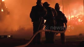 Fire crews tackle massive pallet yard blaze in Perri, CA