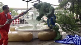Incredible Hulk statue withstands tropical storm but Spiderman and Captain America are blown over