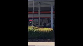 Police Hold POC Man at Gunpoint at ARCO Gas