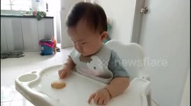 Baby making a mess during mealtime