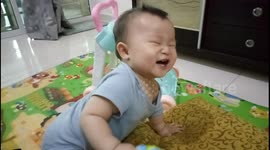 Adorable 'growling' baby experiments with new sound