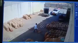 Quick thinking trader evades out-of-control truck in northern India