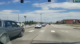 Police chasing a girl wanted for 2 bank robberies right in front of me