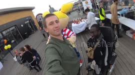 Two friends dancing funny at event