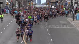 Thousands of runners in the streets of Toronto today raising money for charity