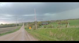 Rotating wall cloud across the Nebraska countryside