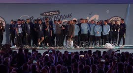Manchester City's squad and staff celebrate winning the Premier League with their fans