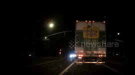 Impatient illegal behavior drivers pass Semi.