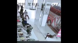 Sliding into danger! Chinese firemen answer emergency call but slip on floor