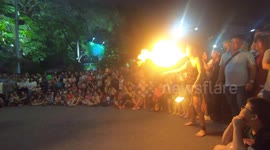 Man blows fire from his mouth is very dangerous and funny
